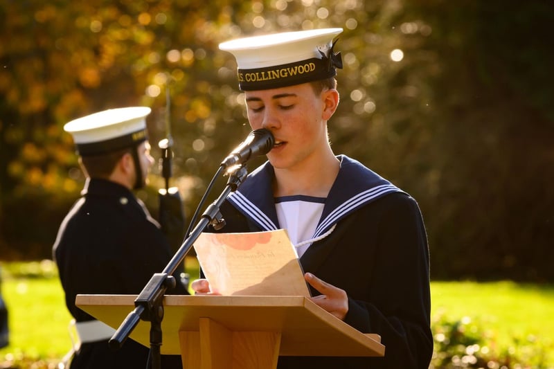 AB John McCrae, youngest Collingwood sailor, reading “In Flanders Fields”.