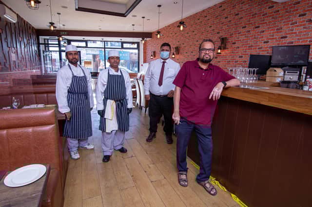 Gulshan Indian Food, London Road, Portsmouth opened in December but had to close and has just reopened for diners
Pictured: Staff Shiful Islam, Rakib Abdur, Shafiur Rahman and owner Abdul Hoque at Gulshan Food, Portsmouth on 9 June 2021
Picture: Habibur Rahman