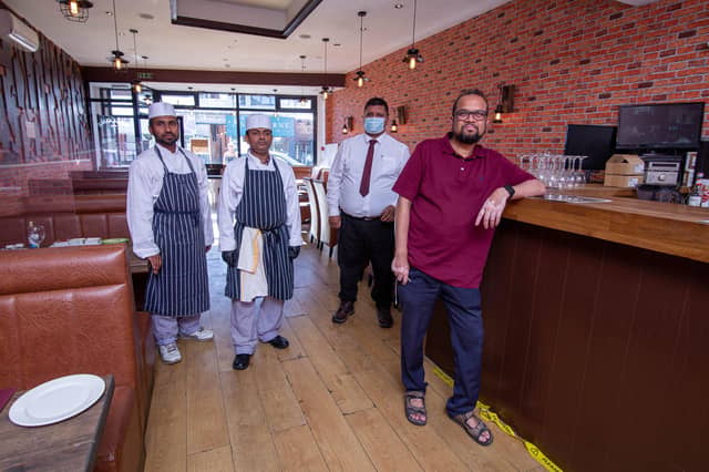Gulshan Indian Food, London Road, Portsmouth opened in December but had to close and has just reopened for diners
Pictured: Staff Shiful Islam, Rakib Abdur, Shafiur Rahman and owner Abdul Hoque at Gulshan Food, Portsmouth on 9 June 2021
Picture: Habibur Rahman
