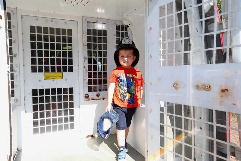 Monty Godfrey, 3, is ‘banged up’ in the back of a police custody van.