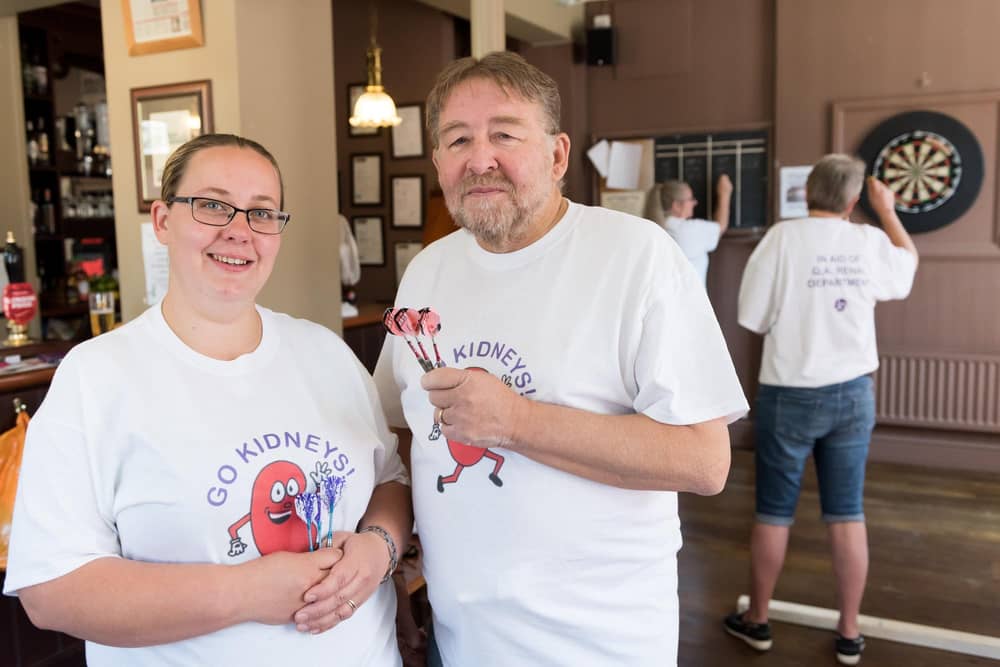 Tina Burrell (L) with her father Allan Harper at event in 2018