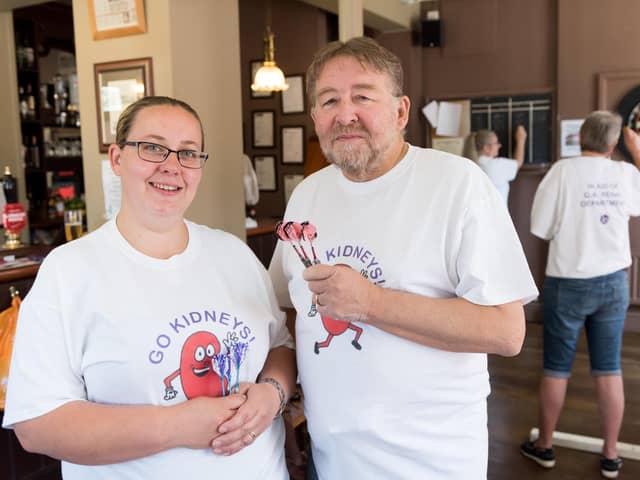 Tina Burrell (L) with her father Allan Harper at event in 2018