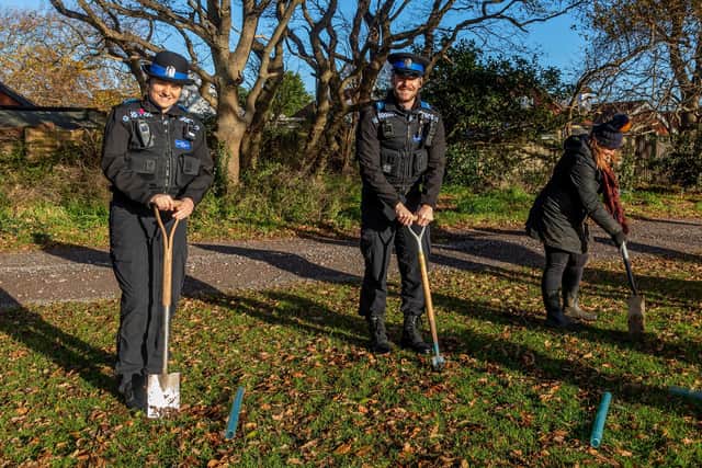 PCSOs Becky Hodson and Tom Presdee joining in with the tree planting on December 1. Picture: Mike Cooter (120121)