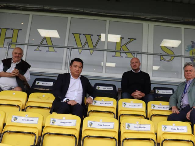 Alan Mak, second left, meets Hawks officials at Westleigh Park last Friday. Pic: HWFC.