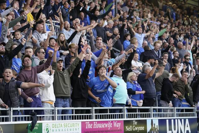 Pompey fans celebrate Reeco Hackett's last-gasp equaliser against Plymouth Picture: Joe Pepler