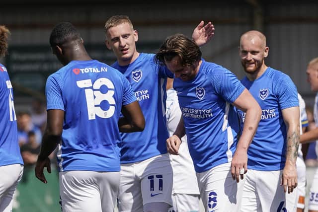Ronan Curtis celebrates with Ryan Tunnicliffe after the midfielder's goal against the Hawks in pre-season