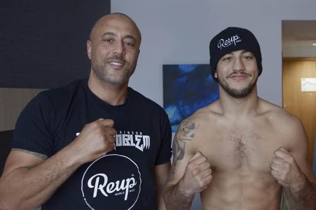 Father and trainer Michael Ballingall, left, with son Mikey McKinson