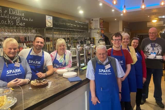 Joseph Sadler, CEO of Kerdos International (second in on the left), with the Spark Community Space team.
