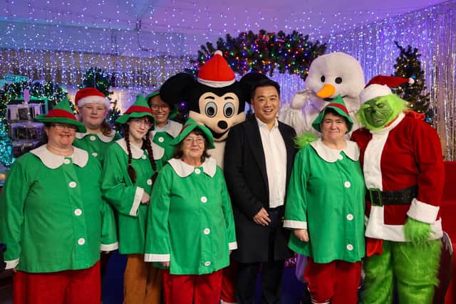 Alan Mak MP with the team of volunteers at Leigh Park Christmas Grotto