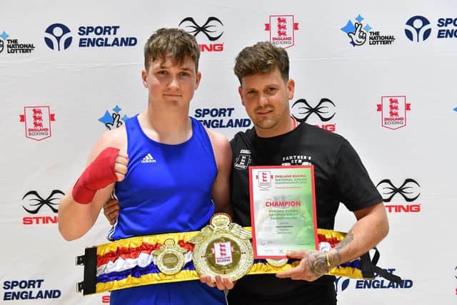Conor McCormack, left, with Panthers Gym coach Ash Whiting after collecting his England national junior boys belt and certificate earlier this year
