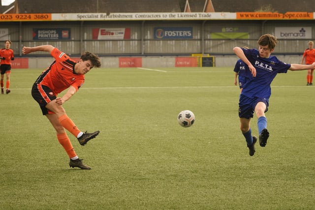 Action from the Portsmouth Youth League Stuart Madigan Cup final between Baffins Milton Rovers Vipers U14s (all blue kit) and AFC Portchester Vikings U14s (orange and black kit). Picture: Keith Woodland (190321-891)
