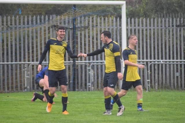 Moneyfields' Dan Penfold has just scored the first of his two goals against Clanfield. Picture: Dan (JMA Media).