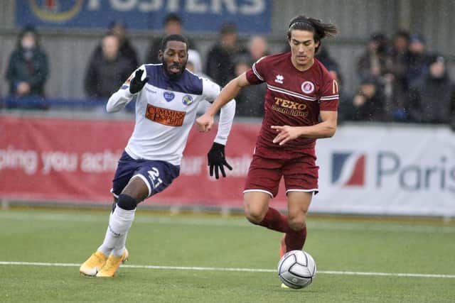 Roarie Deacon, left, in action against Chelmsford on the day fans returned to Westleigh Park. Pic: Kieron Louloudis.