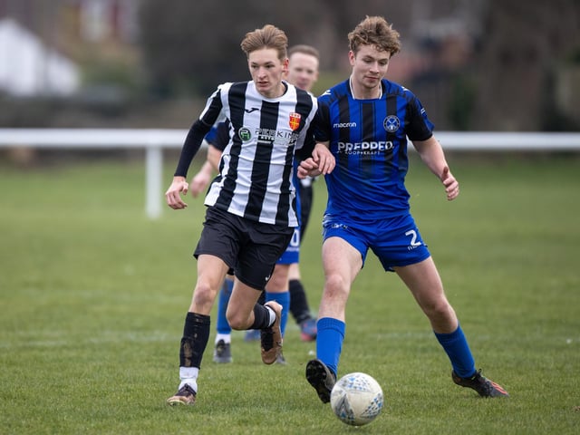 Hayling United (black/white) v Clanfield. Picture by Alex Shute