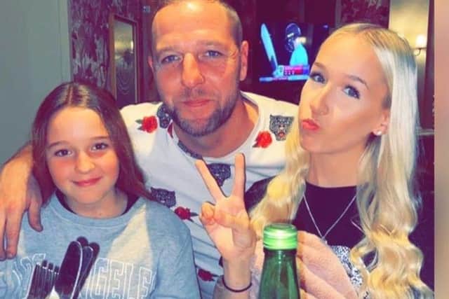 Sister Lily, dad Anthony, and Mia. 