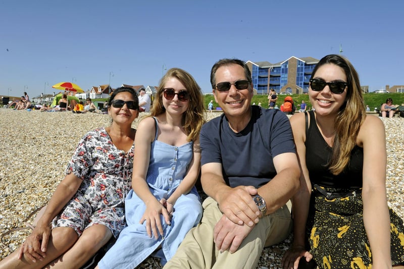 Warm weather at Lee on the Solent. The Brown family from Gosport (left to right), mum Sally, daughter Jasmine, dad Gavin, and daughter Shareen taken on the 7th May 2018. Picture Ian Hargreaves  (180472-1)