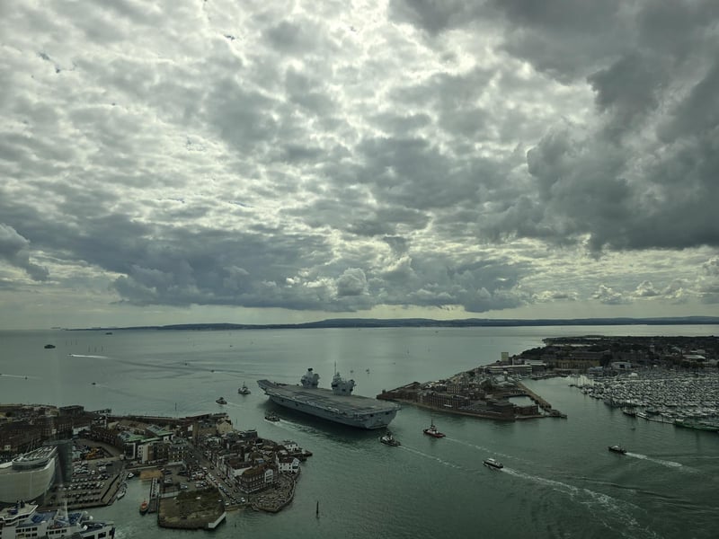 Drone picture of aircraft carrier HMS Prince of Wales leaving Portsmouth on routine tasking.