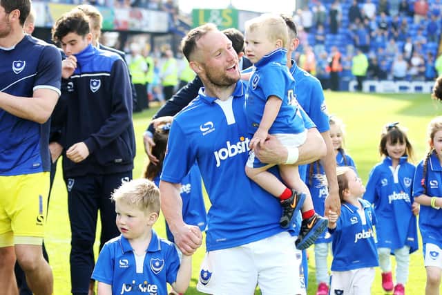 Ben Davies with his family as the Pompey players do a lap of honour around Fratton Park on the final day of the 2015-16 season.