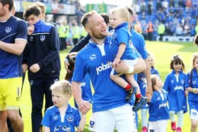 Ben Davies with his family as the Pompey players do a lap of honour around Fratton Park on the final day of the 2015-16 season.