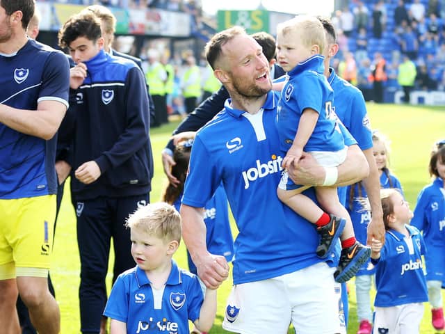 Ben Davies with his family as the Pompey players do a lap of honour around Fratton Park on the final day of the 2015-16 season.