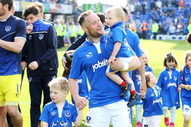 Ben Davies with his family as the Pompey players do a lap of honour around Fratton Park on the final day of the 2015-16 season.