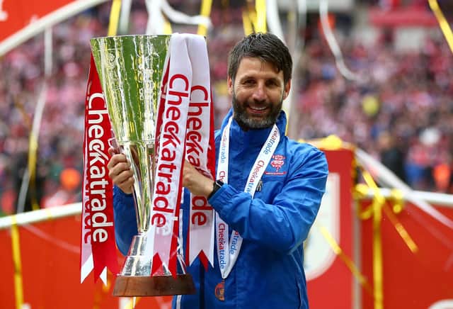Danny Cowley, then-manager of Lincoln City, lifted the Checkatrade Trophy at Wembley in 2018.