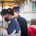 People wearing face masks in Commercial Road, Portsmouth. Picture: Habibur Rahman