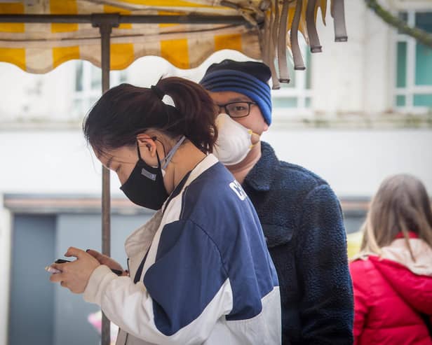 People wearing face masks in Commercial Road, Portsmouth. Picture: Habibur Rahman