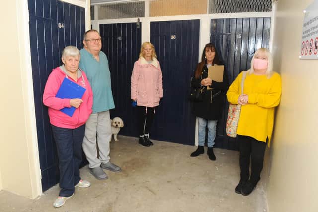 Residents at Guinness flats in West Leigh are angry as the housing association is taking away their storage sheds to provide a sprinkler system and not providing an alternative storage facilty.Pictured is: Residents from Solent House (l-r) Jenny Wright (72) with her husband Mike (76), Lorraine Kirby (66) with her dog Bud, Denise Jenkins (58) and Jules Young (56).Picture: Sarah Standing (301020-7307)