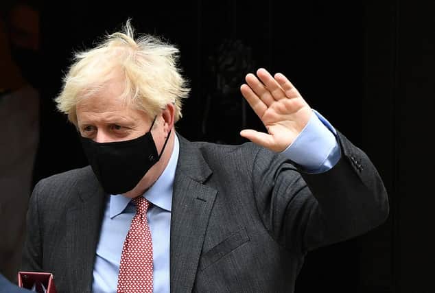 Prime minister Boris Johnson wearing a face mask leaves Downing Street. Picture: Leon Neal/Getty Images