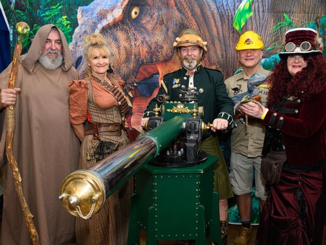 Pictured is: Members of the Gosport Steam Punk Society are joined by a Mystic traveller and member of staff from the Jurassic Park.
Picture: Keith Woodland (140421-4)