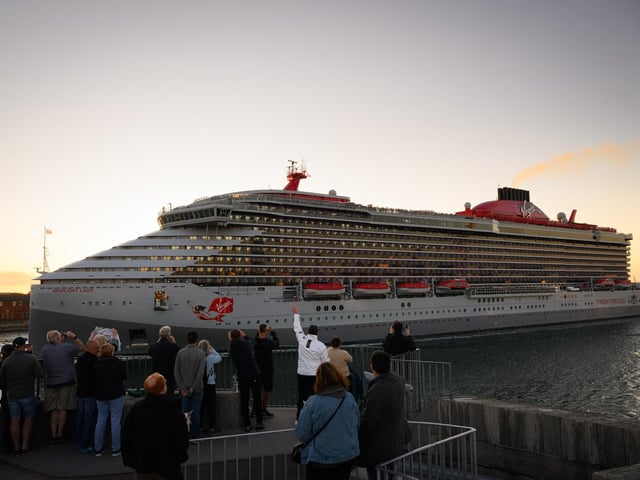 Pictured is: People on the Round Tower wave to the MV Resilient Lady Picture: Keith Woodland (140921-33)