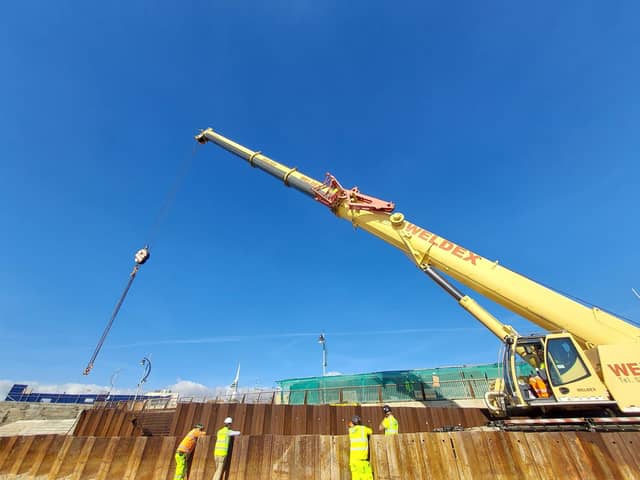 Sea walls shaping up in Southsea

New sea defences are taking shape at the Southsea Coastal Scheme as a massive 220 tonne crane installs the first limestone and granite units that will form a wall to protect the area around Long Curtain Moat from future flooding.