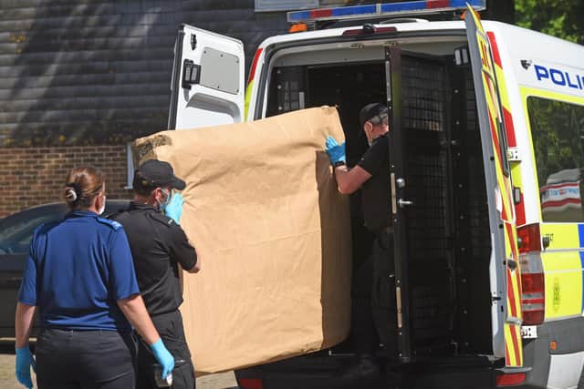 Police remove two mattresses from the property on All Saints Road, Buckland, today following the arrest of three women. Picture: Simon Czapp/Solent News & Photo Agency