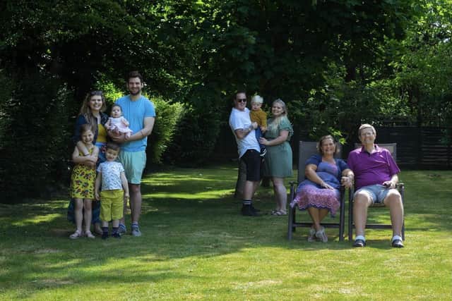 Nick Davies (right) with wife Vanessa at home for a socially distanced photo with their family