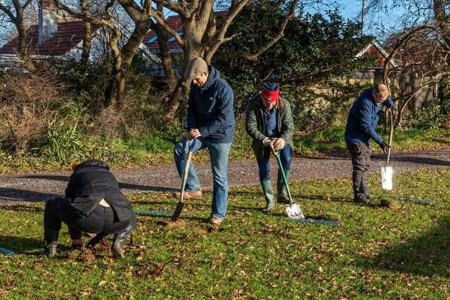 Volunteers at the tree planting in Mengham Park on December 1. Picture: Mike Cooter (120121)