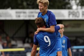 Tommy Leigh celebrates scoring for. Baffins Milton Rovers in the Wessex League