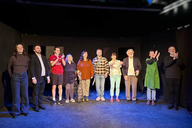 The cast take their curtain call