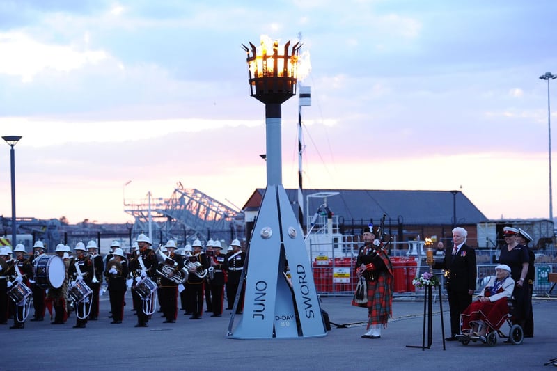 The beacon, which features the names of the beaches were troops landed, after it has been lit at Portsmouth Historic Dockyard