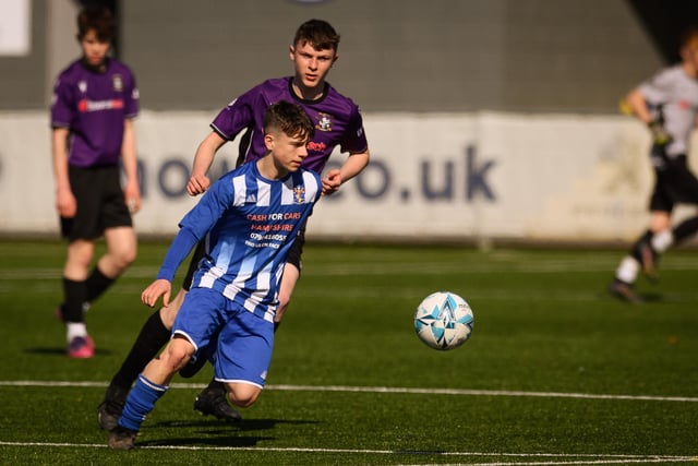 Action from the Portsmouth Youth League U15 Challenge Cup final between Bedhampton Youth (blue and white kit) and Gosport Falcons. Picture: Keith Woodland (190321-255)