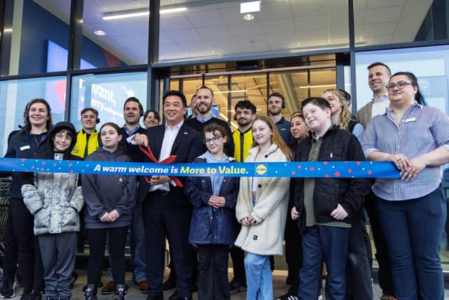 Alan Mak MP cuts the ribbon to officially open the new Lidl store in Purbrook Way, Havant