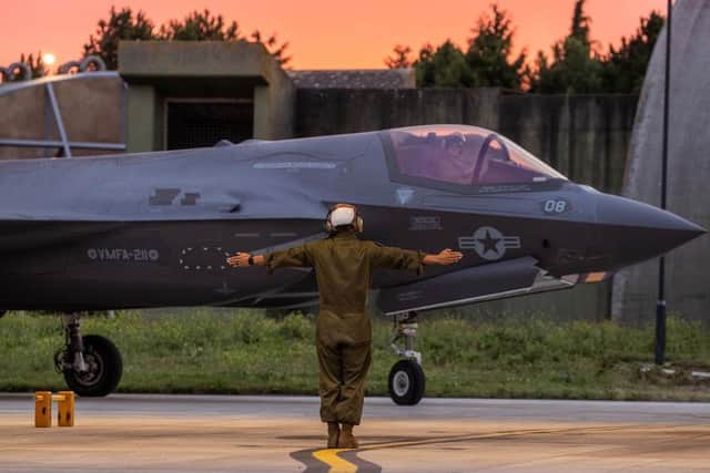 A US F-35B fighter jet is guided into RAF Marham, in Norfolk, ahead of embarking on HMS Queen Elizabeth later this month. Photo: MoD