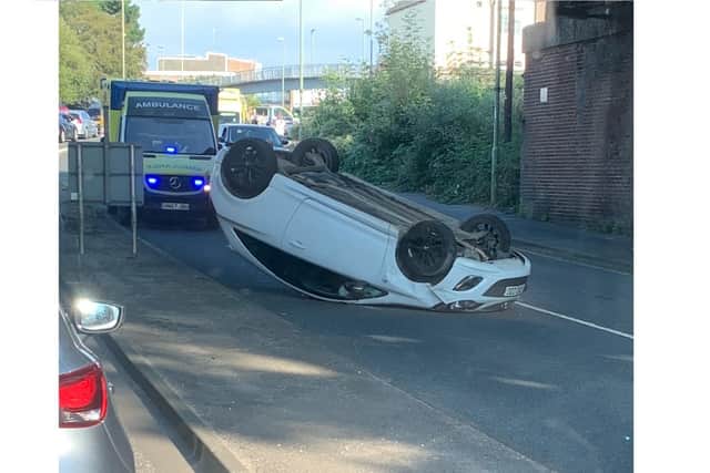 A car rolled on its top following a three-vehicle incident in Fareham on September 16, 2021. Picture: Steve Holmes