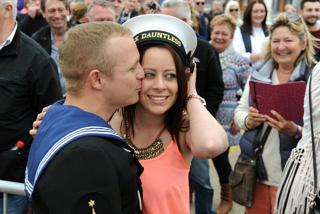 15th May 2015. Sam Luckett proposes to Danielle Cotton. Home coming of HMS Dauntless at Portsmouth Dockyard, Portsmouth. 
 Picture: Allan Hutchings (150741-027)