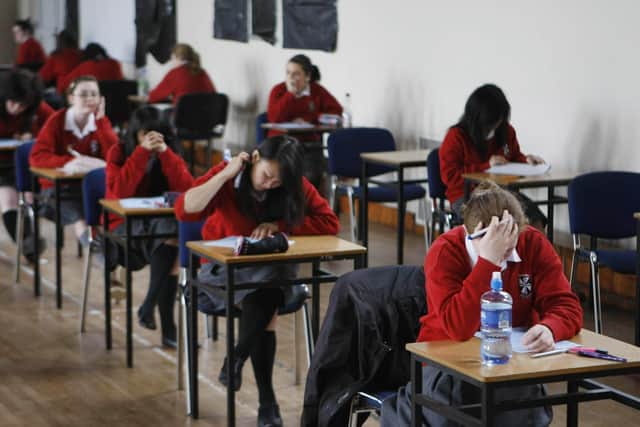 Undated file photo of students sitting an exam. Picture: Niall Carson/PA Wire
