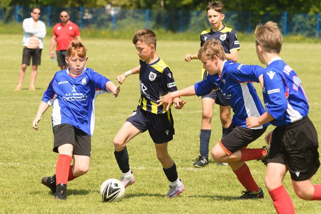 Action from the Clanfield youth football tournament at Horndean Technology College. Picture: Keith Woodland (270521-575)