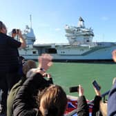 The Royal Navy aircraft carrier HMS Queen Elizabeth arrives back in Portsmouth Naval Base after taking part in major exercises off Scotland. PA Photo: Gareth Fuller/PA Wire