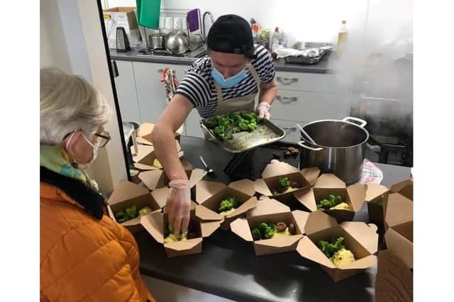 St M's Events in Paulsgrove has been handing out free meatballs to the community on Meatball Mondays. Pictured: Louis Coward, London chef usually serving food at Soho House, whipping up some meatballs and mash