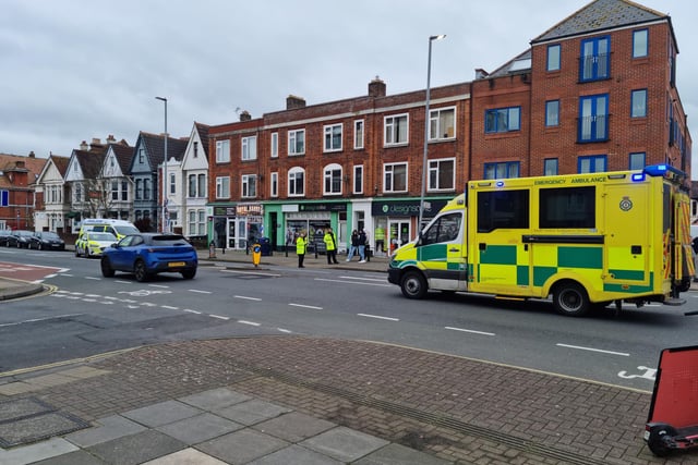 London Road crash scene in Portsmouth that left woman seriously injured
