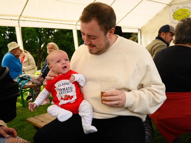 Pictured is: A 7 week old visitor to the South Downs Food Festival is suitably dressed for the event Picture: Keith Woodland (140921-95)
